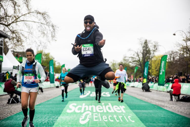Picture of a runner finishing at the Paris Marathon 2025