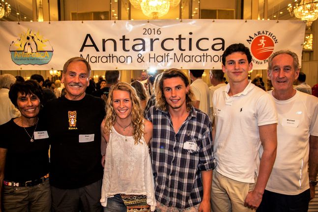 Runners pose at the Antarctica Marathon, one of the core marathons of the Seven Continents Club