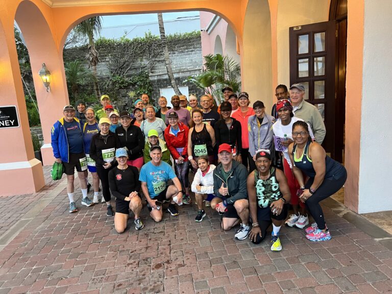 Runners posing ahead of the Bermuda Triangle Challenge 2025