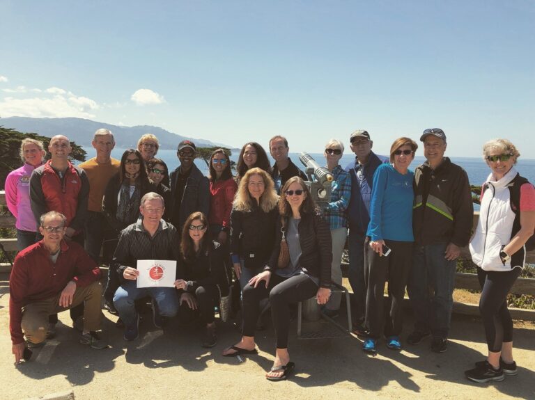 Photo of runners celebrating having completed the Big Sur Marathon 2025