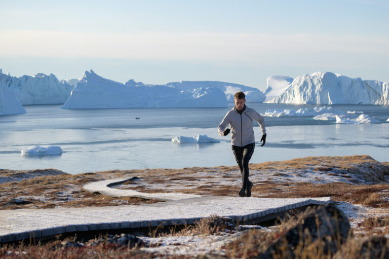 Photo of a runner tackling the IceFjord Midnight Marathon