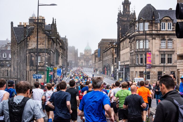 Photo of the Edinburgh Marathon 2025 passing through Edinburgh city centre