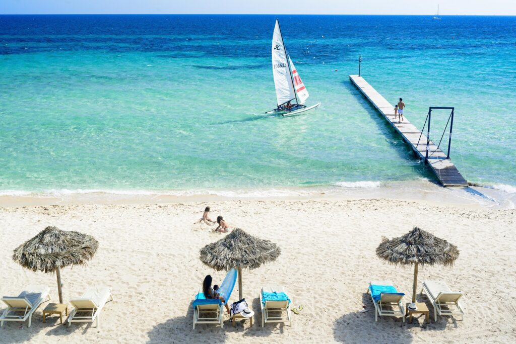 Sun loungers on the beach at the Forte Village Resort Sardinia