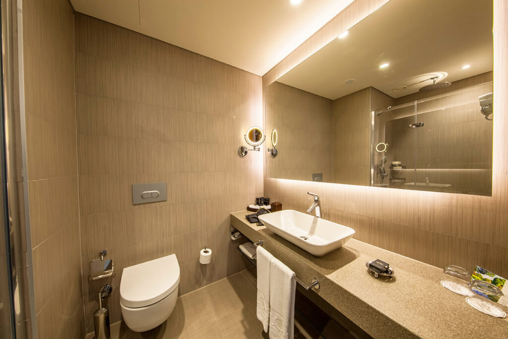In-room bathroom at the Gloria Sports Arena