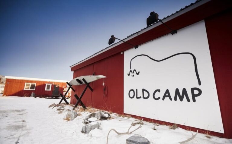 Signage of the Old Camp Hostel, hotel option for the Polar Circle Marathon 2024