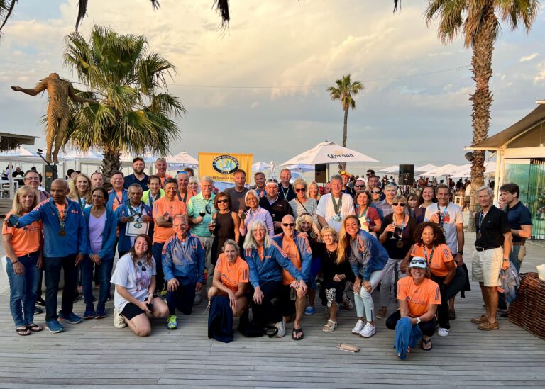 Photo of runners celebrating together ahead of the Cape Town Marathon 2024