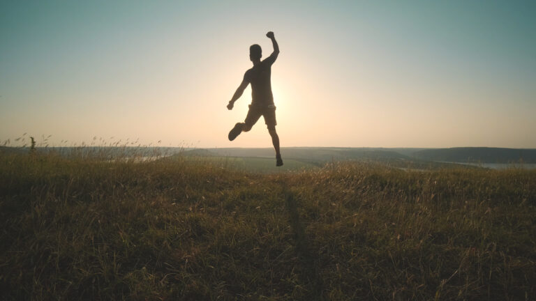 A runner celebrates having taken part in the Trail Escape Manchester