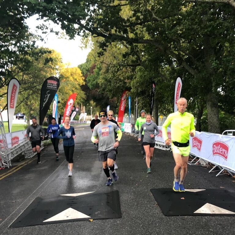 Runners approaching the finish line at the Loch Ness Marathon 2025