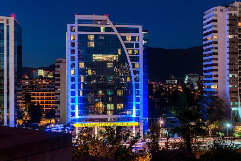 Exterior night shot of the Renaissance Santiago Hotel, hotel option for the Patagonia Marathon 2025