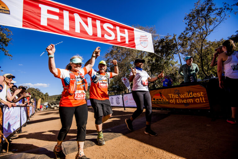 Photo of runners finishing the Big Five Marathon 2025